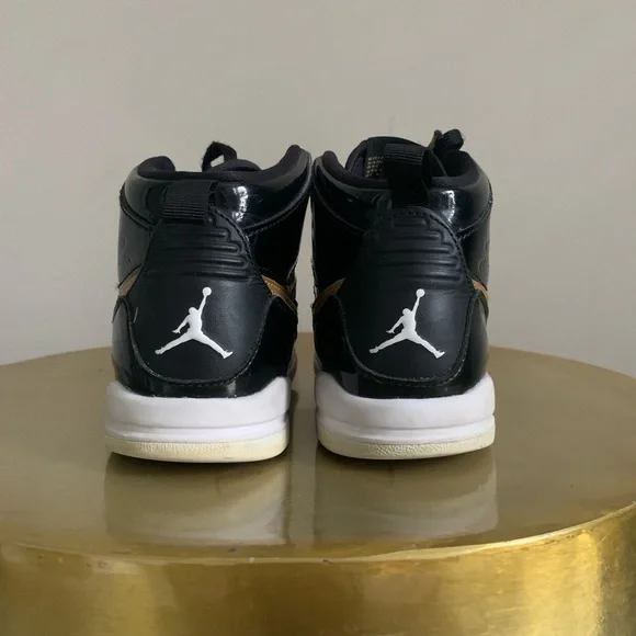 Air Jordan black and gold boys size 1